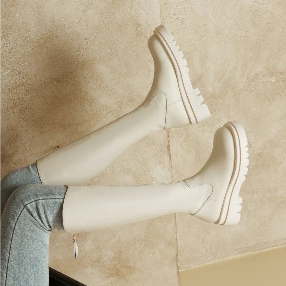 Looks like summer white knee high boots